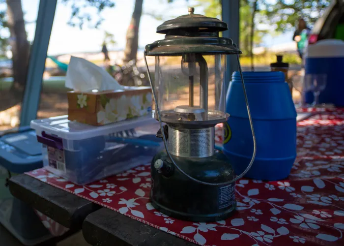 Table with lantern at campground